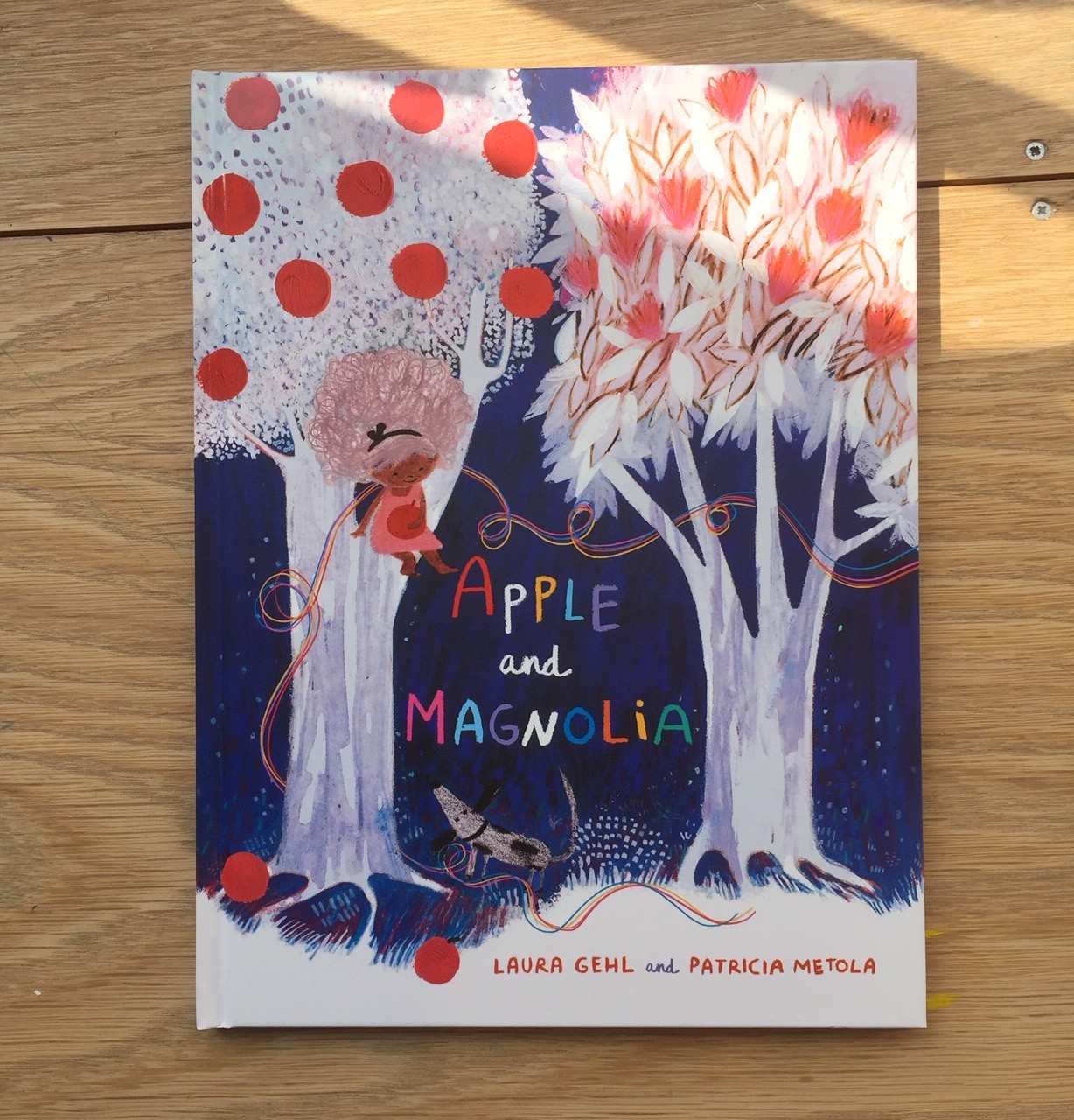 Cover of Apple and Magnolia by Laura Gehl and illustrated by Patricia Metola