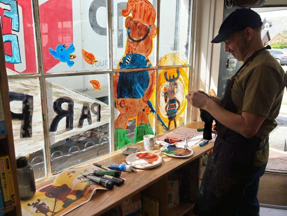 Justin Worsley painting our window